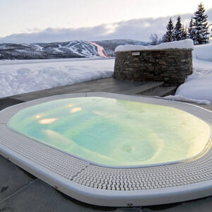 winter outdoor spa at scandinavian ski resort.